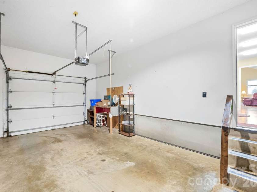 310 Robertson Street, Burnsville, NC 28714.  MLS# CAR4424794, YatesRealty ID 51987. Garage