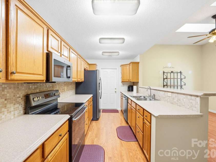 310 Robertson Street, Burnsville, NC 28714.  MLS# CAR4424794, YatesRealty ID 51987. Kitchen