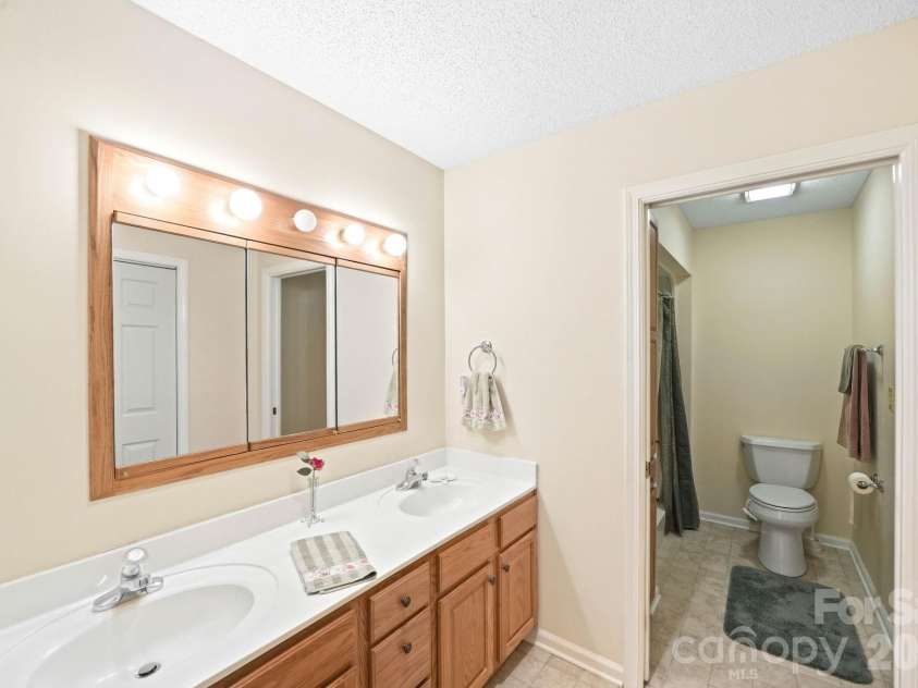 310 Robertson Street, Burnsville, NC 28714.  MLS# CAR4424794, YatesRealty ID 51987. Master Bathroom
