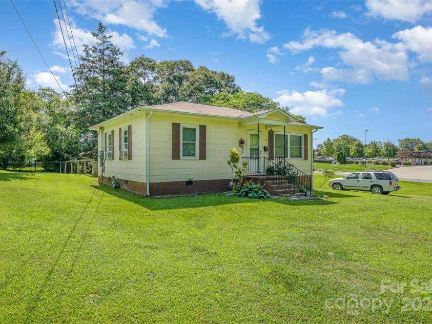 422 Wilson Street, Mount Holly, NC 28120.  MLS# CAR4272159, YatesRealty ID 520. Front of 410 Wilson