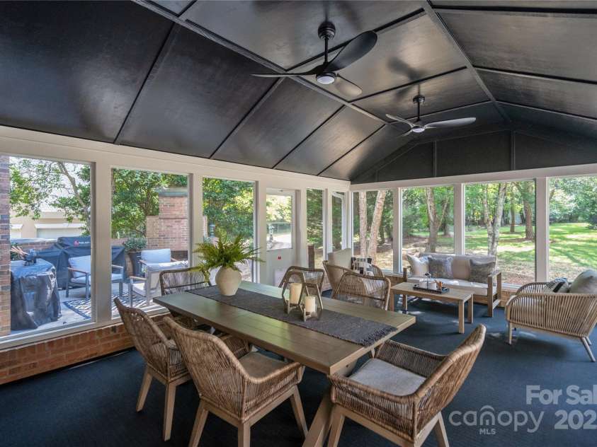 8503 Foxbridge Drive, Matthews, NC 28104.  MLS# CAR4179020, YatesRealty ID 5201. Easy-to-clean custom outdoor carpet in the screened in porch.