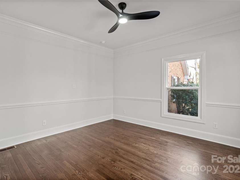 8503 Foxbridge Drive, Matthews, NC 28104.  MLS# CAR4179020, YatesRealty ID 5201. Guest Bedroom or Flex Room on the main with nice size closet.
