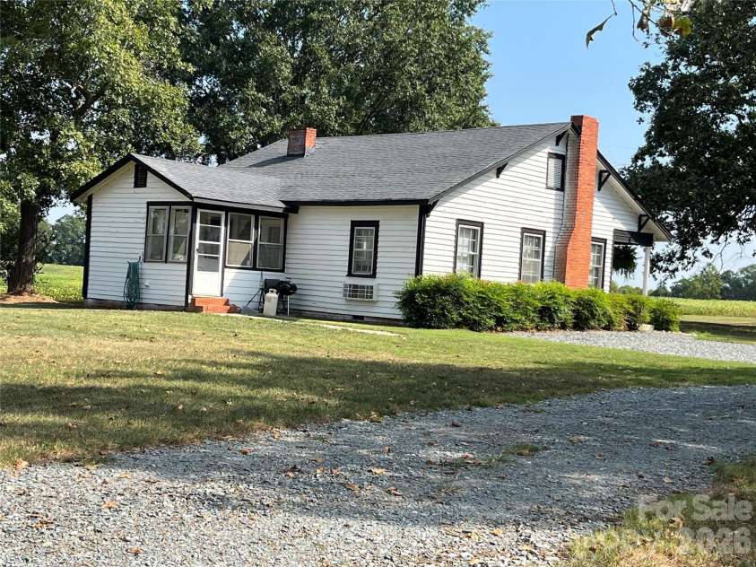 5810 Wolf Pond Road, Monroe, NC 28112.  MLS# CAR4426485, YatesRealty ID 52012. Rear view facing Wolf Pond Rd