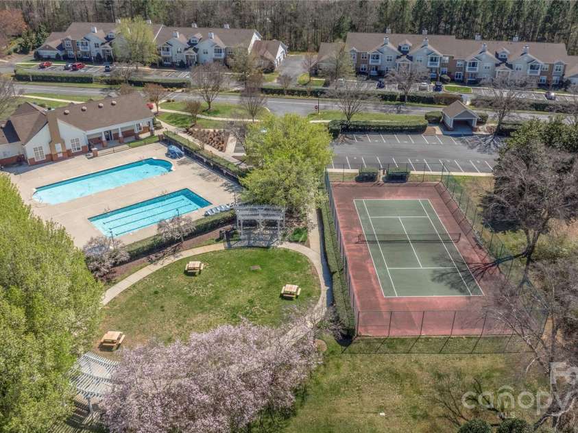 16312 Redstone Mountain Lane, Charlotte, NC 28277.  MLS# CAR4237110, YatesRealty ID 5202. Aerial view of park, pools, clubhouse and tennis courts