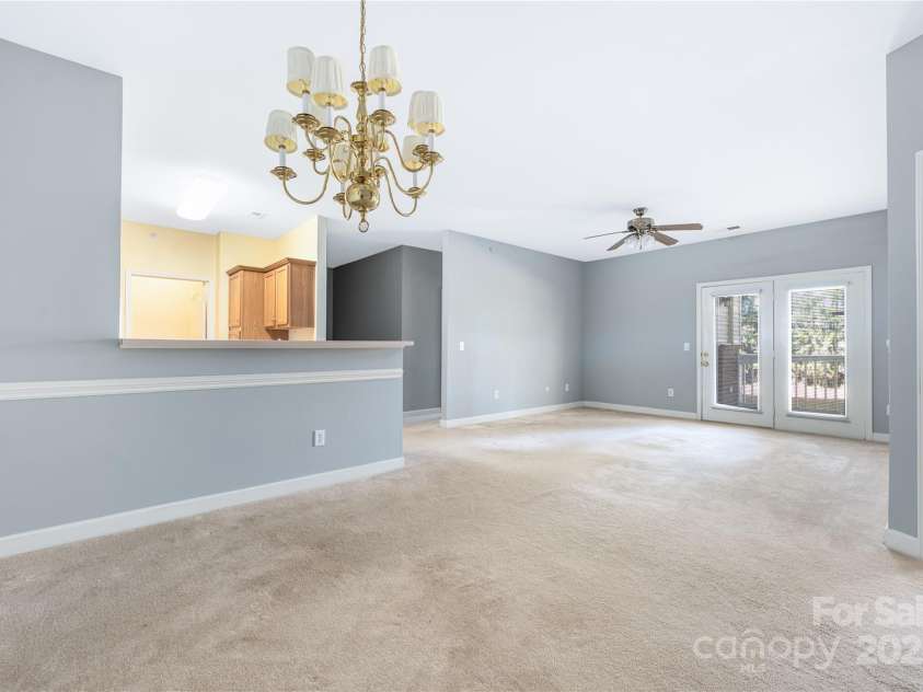 16312 Redstone Mountain Lane, Charlotte, NC 28277.  MLS# CAR4237110, YatesRealty ID 5202. View from dining area towards kitchen and living room