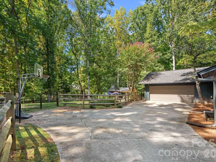 3100 Indian Rock Road, Charlotte, NC 28270.  MLS# CAR4425804, YatesRealty ID 52020. Attached Garage