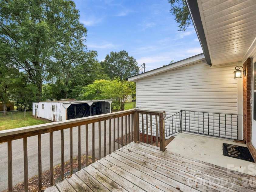 1094 Union Street, Concord, NC 28025.  MLS# CAR4426577, YatesRealty ID 52033. Great back deck for entertaining right off the kitchen!