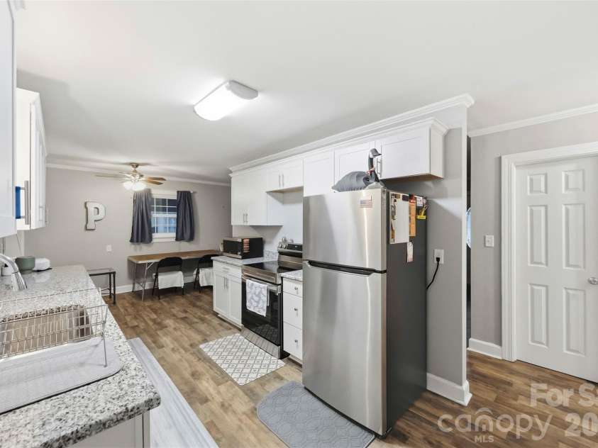 1094 Union Street, Concord, NC 28025.  MLS# CAR4426577, YatesRealty ID 52033. Kitchen with Walk-In Pantry
