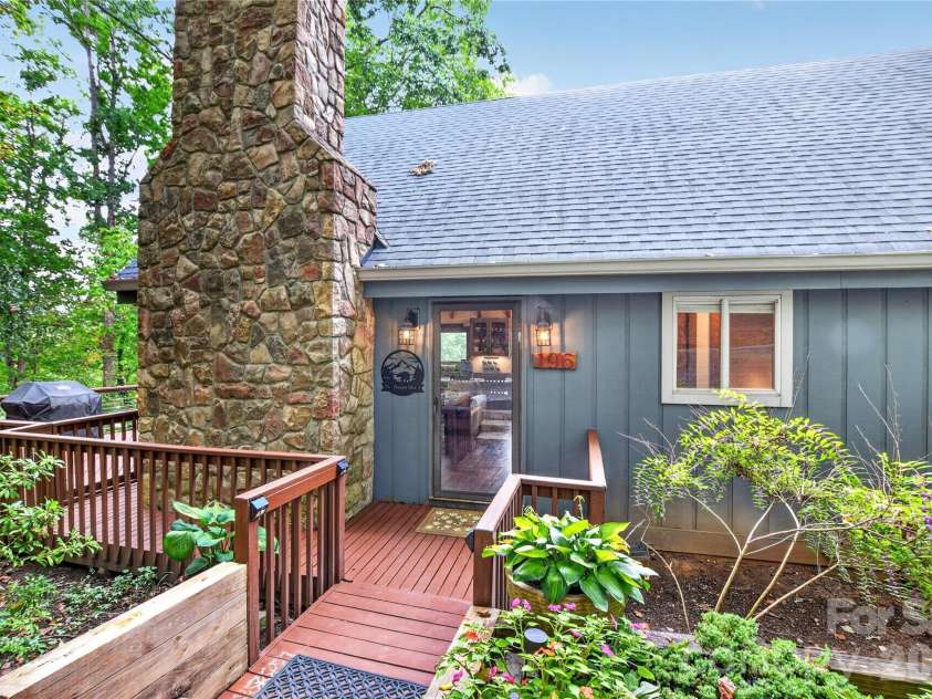 196 Fern Loop, Lake Lure, NC 28746.  MLS# CAR4425558, YatesRealty ID 52036. Front of home