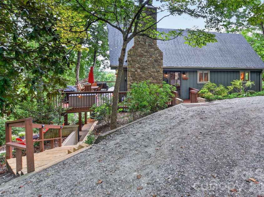 196 Fern Loop, Lake Lure, NC 28746.  MLS# CAR4425558, YatesRealty ID 52036. Front of home
