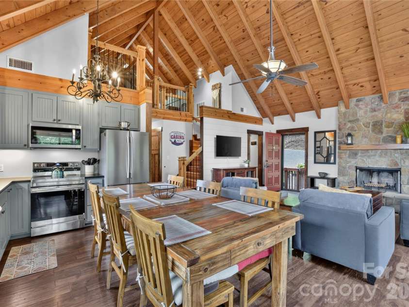 196 Fern Loop, Lake Lure, NC 28746.  MLS# CAR4425558, YatesRealty ID 52036. Kitchen and LR