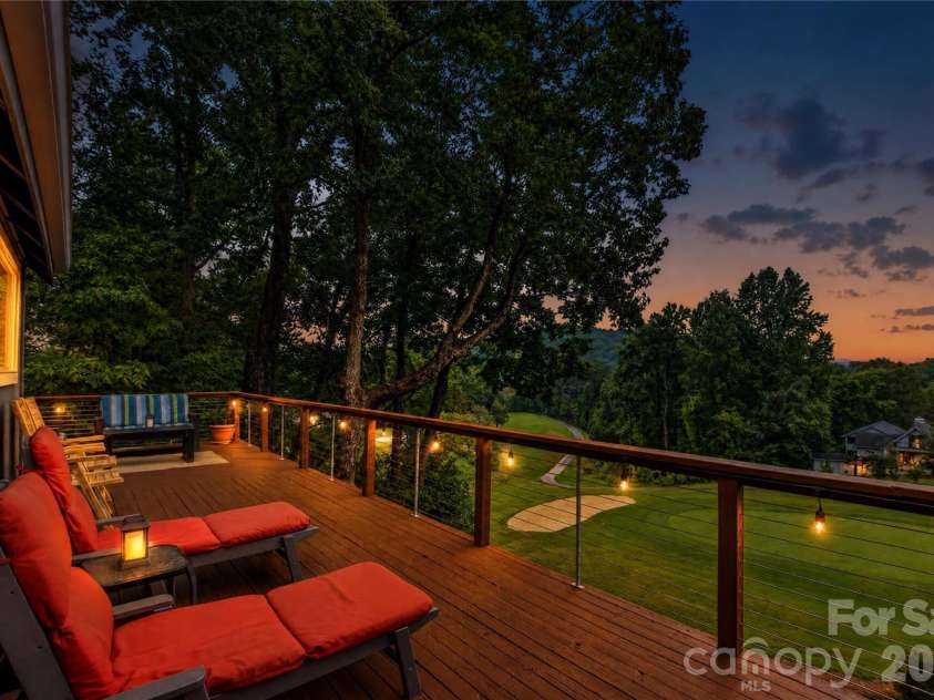 196 Fern Loop, Lake Lure, NC 28746.  MLS# CAR4425558, YatesRealty ID 52036. Twilight view of golf course