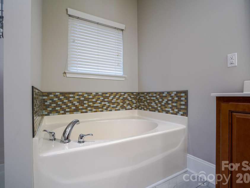 2009 Orby Avenue, Indian Trail, NC 28079.  MLS# CAR4330899, YatesRealty ID 5204. Master bathroom 
