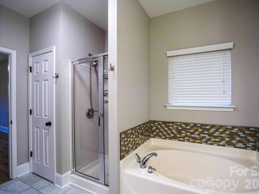 2009 Orby Avenue, Indian Trail, NC 28079.  MLS# CAR4330899, YatesRealty ID 5204. Master bathroom 
