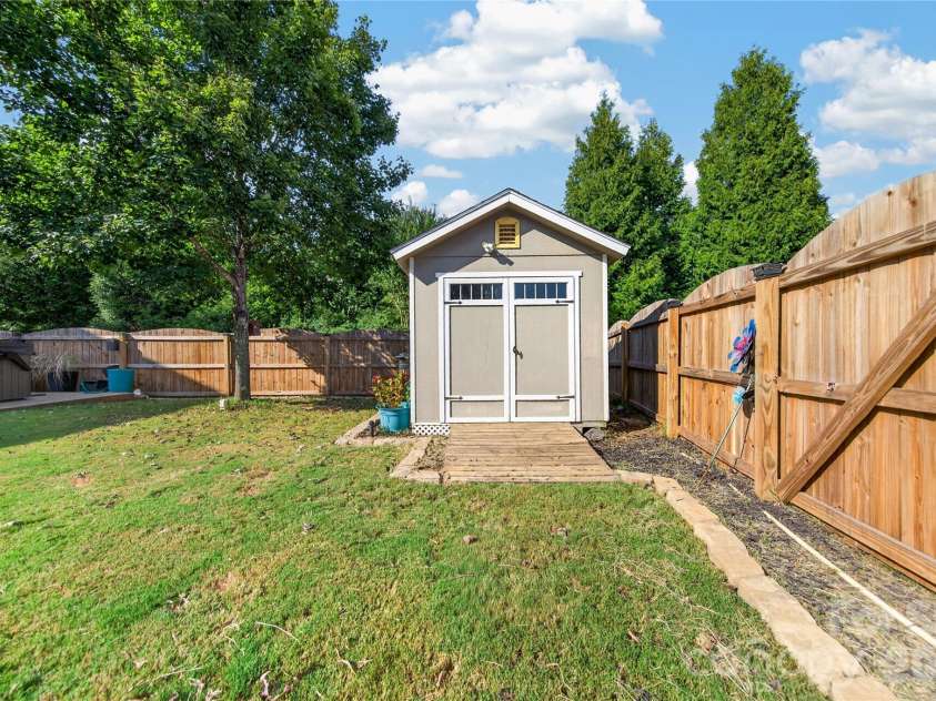 507 Fair Oaks Drive, Fort Mill, SC 29708.  MLS# CAR4423994, YatesRealty ID 52040. Storage Shed with Power
