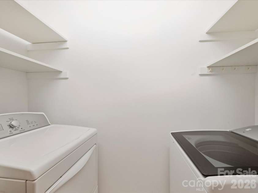 8929 Challis Hill Lane, Charlotte, NC 28226.  MLS# CAR4422460, YatesRealty ID 52046. Laundry Room