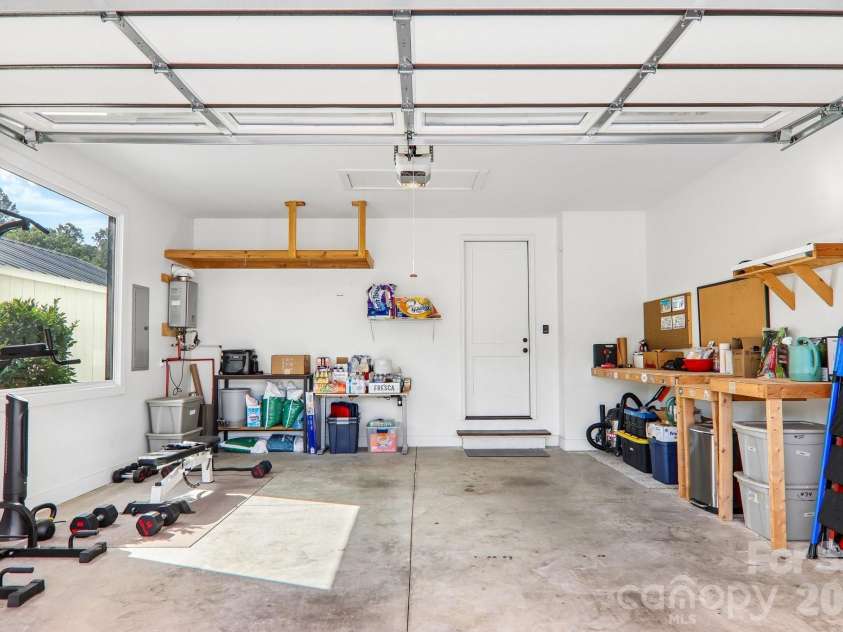 107 New Pinner Place, Arden, NC 28704.  MLS# CAR4426585, YatesRealty ID 52049. 2 Double Car Garage with Window and exterior door