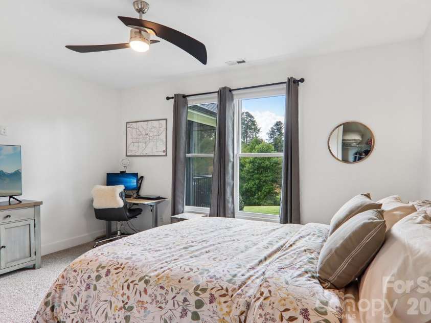 107 New Pinner Place, Arden, NC 28704.  MLS# CAR4426585, YatesRealty ID 52049. 2nd Bedroom West Views Back yard