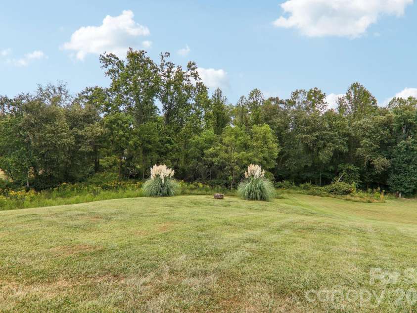 107 New Pinner Place, Arden, NC 28704.  MLS# CAR4426585, YatesRealty ID 52049. Fire Pit
