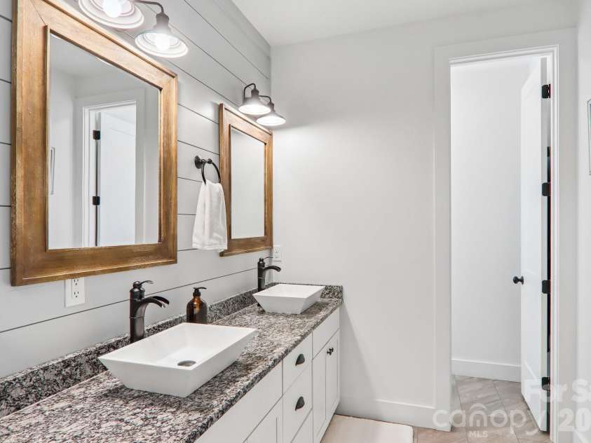 107 New Pinner Place, Arden, NC 28704.  MLS# CAR4426585, YatesRealty ID 52049. Master Bath Double sinks