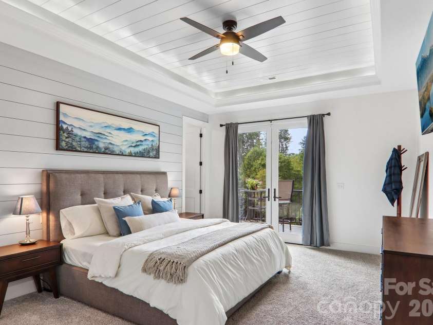 107 New Pinner Place, Arden, NC 28704.  MLS# CAR4426585, YatesRealty ID 52049. Master Bedroom, Trail Celings  With access to the deck