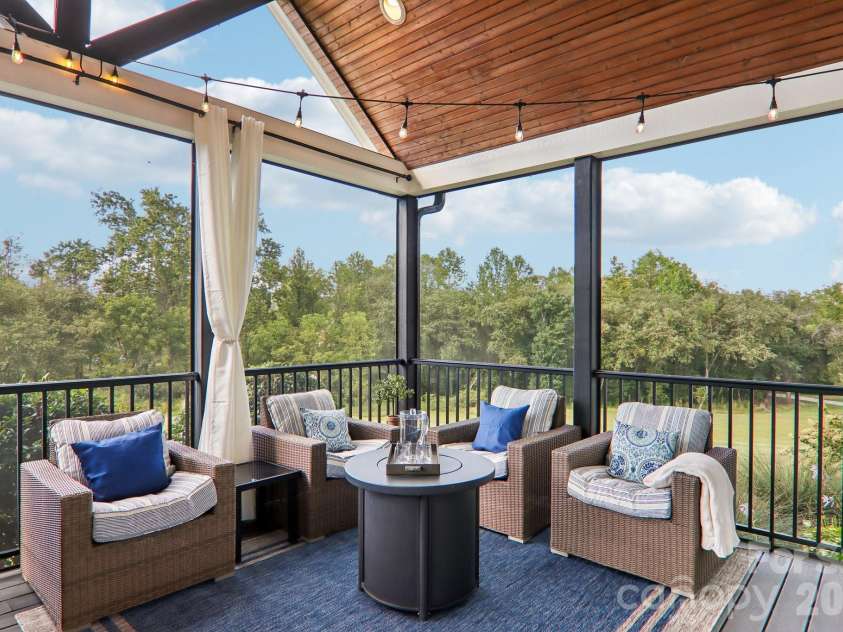 107 New Pinner Place, Arden, NC 28704.  MLS# CAR4426585, YatesRealty ID 52049. Screened Back Porch
