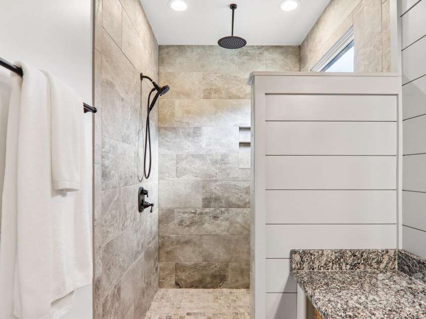 107 New Pinner Place, Arden, NC 28704.  MLS# CAR4426585, YatesRealty ID 52049. Spa Walking Shower