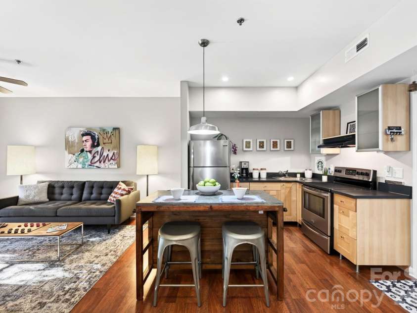 125 Clingman Avenue, Asheville, NC 28801.  MLS# CAR4424553, YatesRealty ID 52056. Kitchen island for extra counter space