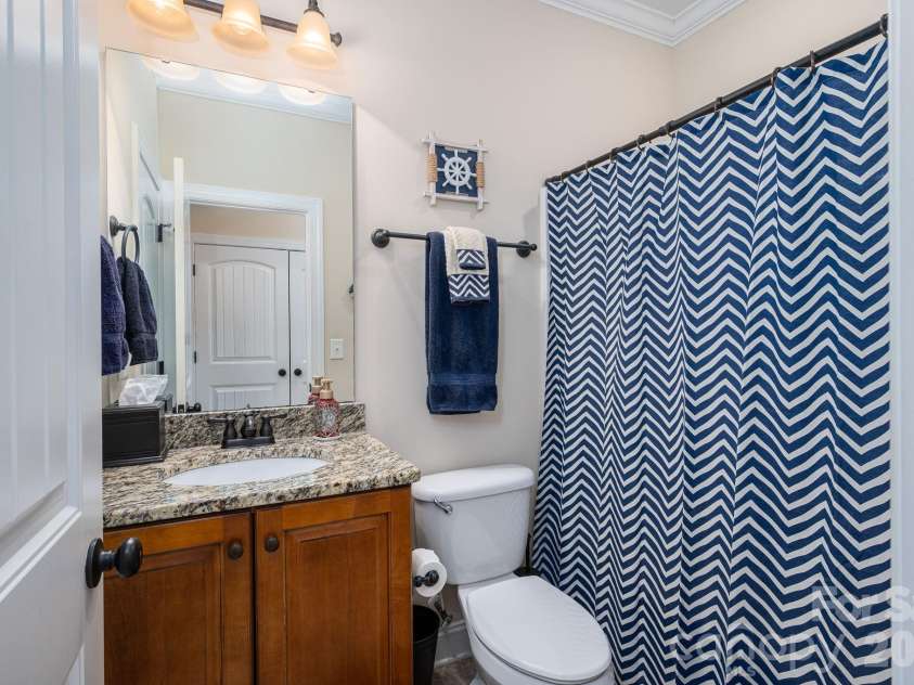 4708 McDade Lane, Gastonia, NC 28056.  MLS# CAR4423980, YatesRealty ID 52068. Downstairs Full Bathroom