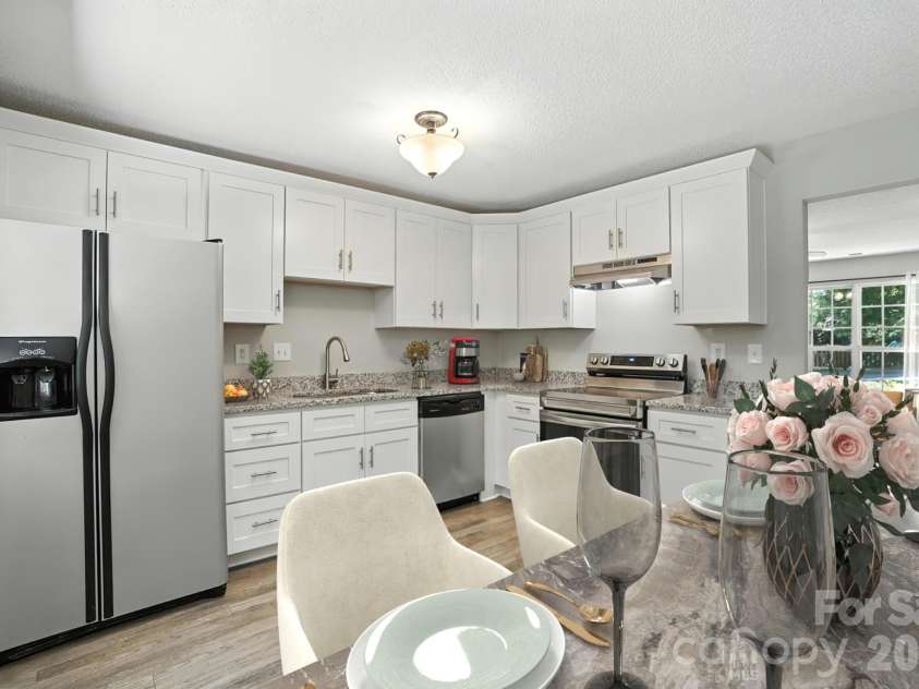 14658 Laura Michelle Road, Huntersville, NC 28078.  MLS# CAR4426228, YatesRealty ID 52071. Kitchen/Dining - Virtually Staged