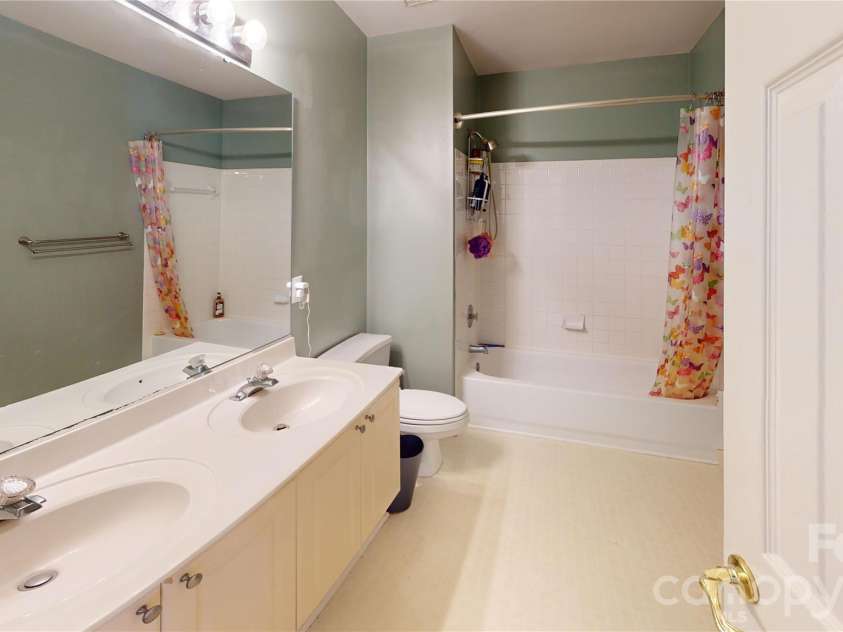 1606 Thornblade Ridge Drive, Matthews, NC 28105.  MLS# CAR4424953, YatesRealty ID 52073. Full  bath, dual sinks, tub shower
