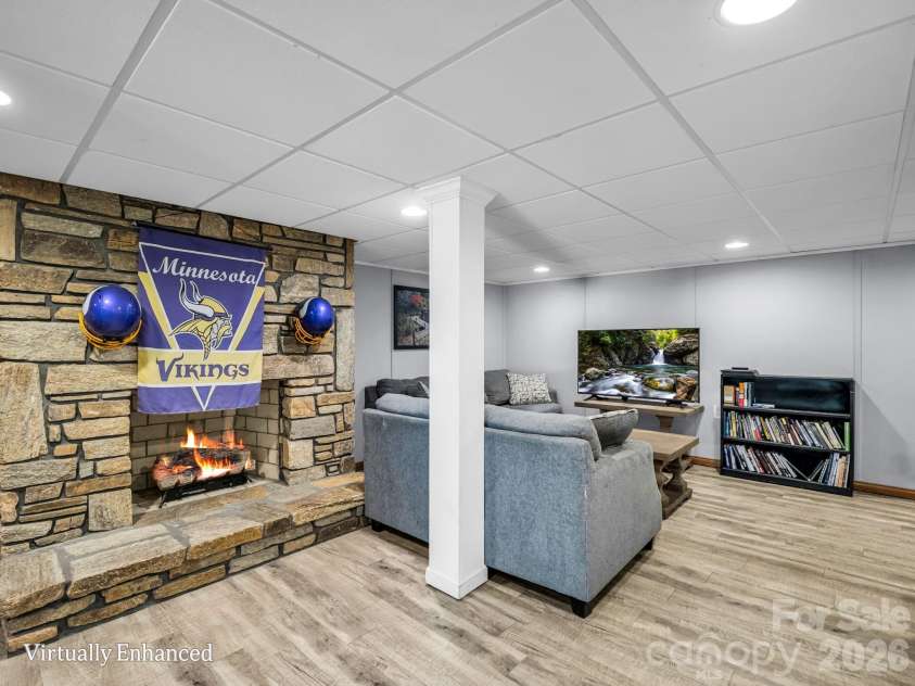 215 Hillcrest Drive, Columbus, NC 28722.  MLS# CAR4424908, YatesRealty ID 52075. Basement with fireplace