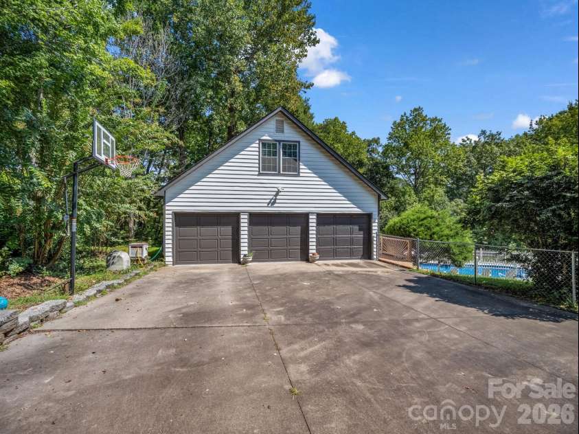 215 Hillcrest Drive, Columbus, NC 28722.  MLS# CAR4424908, YatesRealty ID 52075. Detached garage with pool house