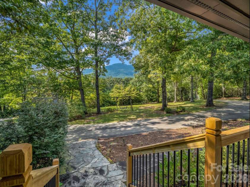 215 Hillcrest Drive, Columbus, NC 28722.  MLS# CAR4424908, YatesRealty ID 52075. Front porch view