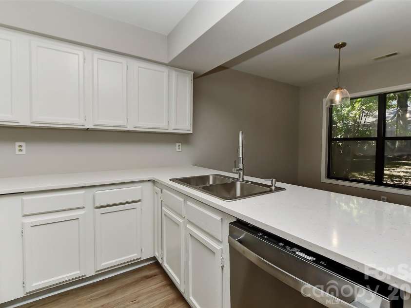 1023 Cranberry Circle, Fort Mill, SC 29715.  MLS# CAR4426644, YatesRealty ID 52079. Kitchen over looking dining room