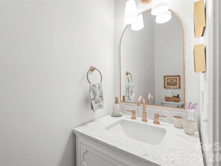 7606 Dinniston Drive, Huntersville, NC 28078.  MLS# CAR4422908, YatesRealty ID 52090. Updated half bath