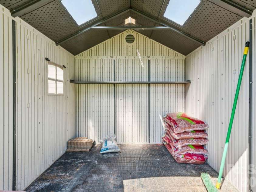 7628 Jenny Ann Drive, Charlotte, NC 28216.  MLS# CAR4426571, YatesRealty ID 52093. 8'x7.5' Lifetime Storage Shed
