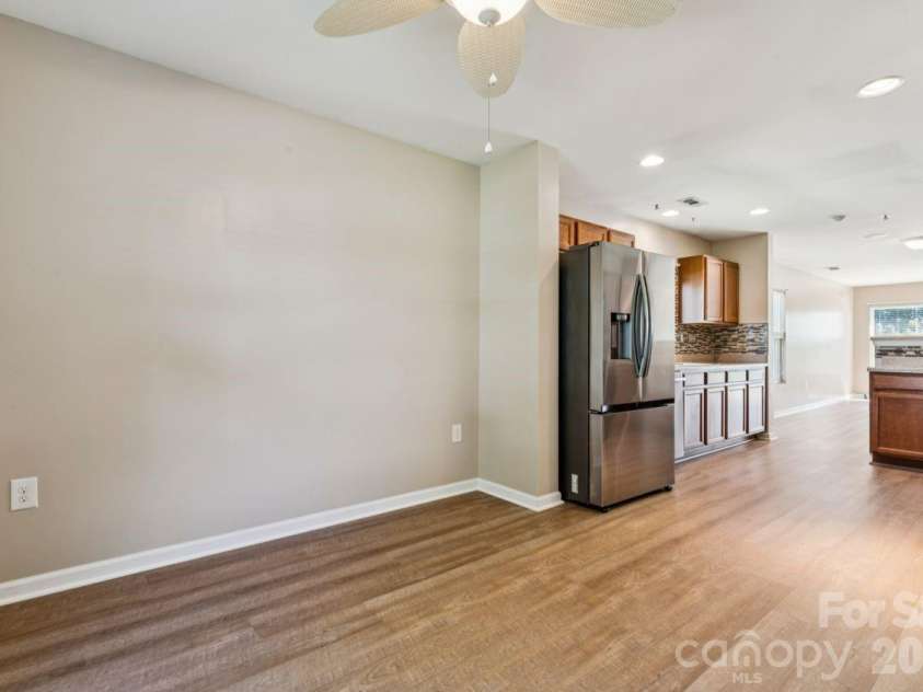 7628 Jenny Ann Drive, Charlotte, NC 28216.  MLS# CAR4426571, YatesRealty ID 52093. Dining Room beside kitchen