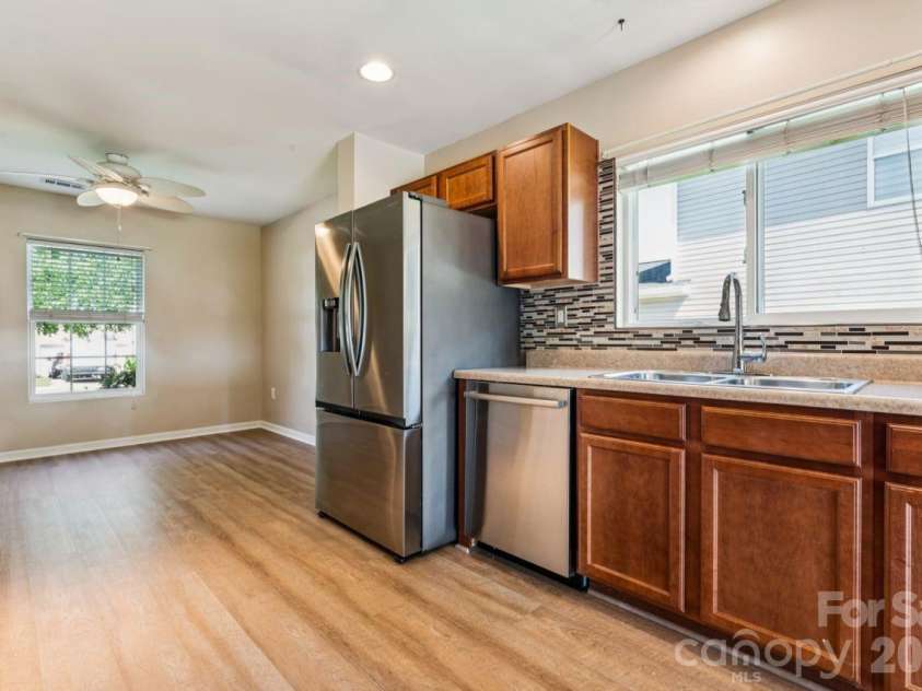 7628 Jenny Ann Drive, Charlotte, NC 28216.  MLS# CAR4426571, YatesRealty ID 52093. Refrigerator w/ ice maker, dishwasher, in sink disposal