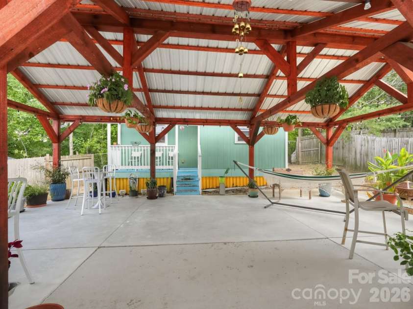 1670 Coryton Way, High Point, NC 27260.  MLS# CAR4425744, YatesRealty ID 52096. Large covered outdoor entertainment area