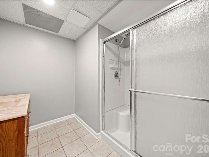 109 Woodside Avenue, Gastonia, NC 28054.  MLS# CAR4426139, YatesRealty ID 52105. Basement level secondary full bathroom