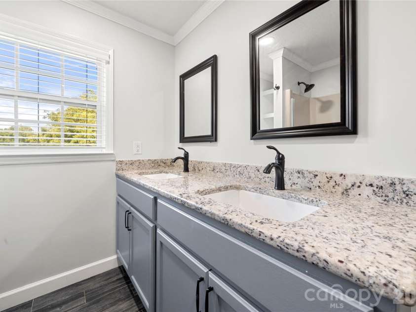 109 Woodside Avenue, Gastonia, NC 28054.  MLS# CAR4426139, YatesRealty ID 52105. Main level secondary bathroom double vanity