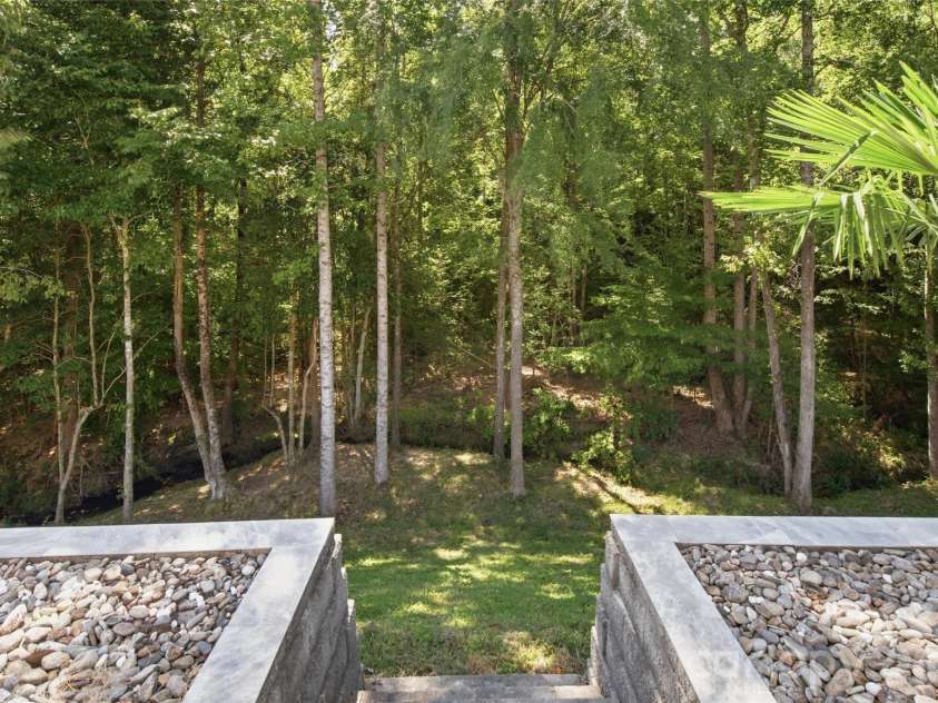 5134 Cressingham Drive, Indian Land, SC 29707.  MLS# CAR4425302, YatesRealty ID 52112. Retaining wall and green space