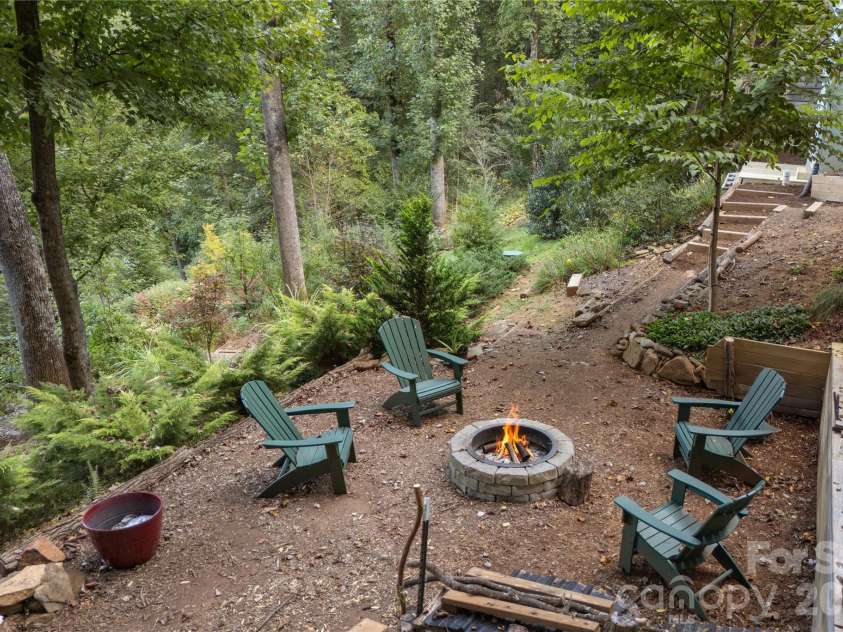110 Quail Mountain Lane, Waynesville, NC 28786.  MLS# CAR4424241, YatesRealty ID 52123. Fire pit