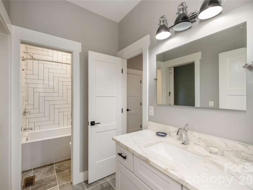 110 Quail Mountain Lane, Waynesville, NC 28786.  MLS# CAR4424241, YatesRealty ID 52123. Lower level bath