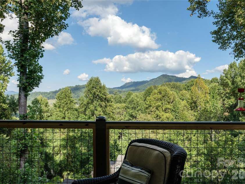110 Quail Mountain Lane, Waynesville, NC 28786.  MLS# CAR4424241, YatesRealty ID 52123. Main level deck