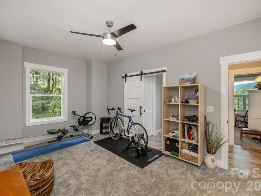 110 Quail Mountain Lane, Waynesville, NC 28786.  MLS# CAR4424241, YatesRealty ID 52123. Third bedroom on lower level