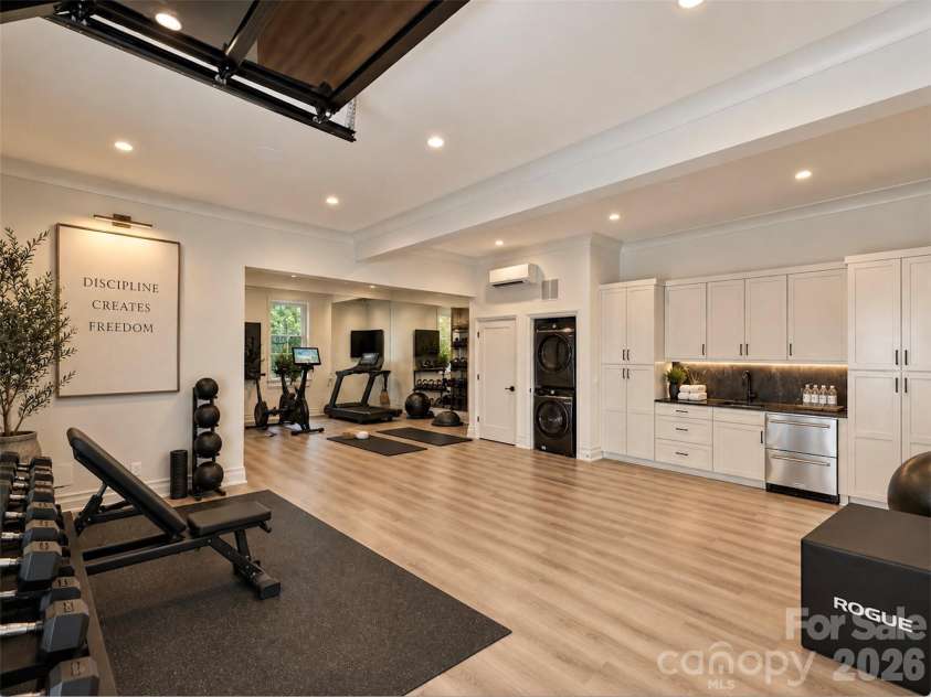 600 Hermitage Road, Charlotte, NC 28207.  MLS# CAR4422657, YatesRealty ID 52142. 2nd living quarters virtually staged as a gym