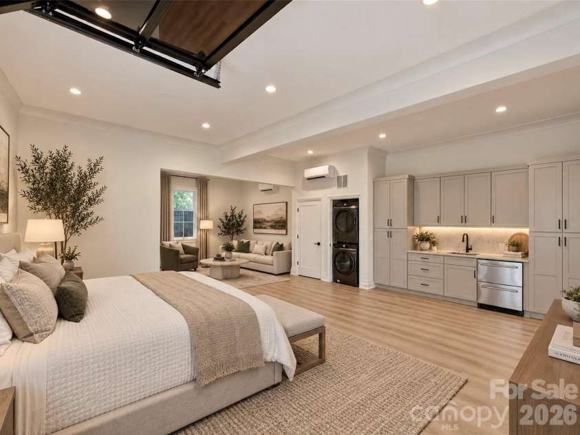 600 Hermitage Road, Charlotte, NC 28207.  MLS# CAR4422657, YatesRealty ID 52142. 2nd living quarters with full bath, kitchenette and laundry virtually staged as a guest quarters