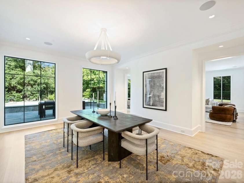 600 Hermitage Road, Charlotte, NC 28207.  MLS# CAR4422657, YatesRealty ID 52142. Dining room overlooking outdoor pool area